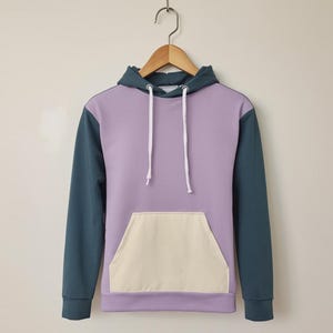 Unisex Pastel Hoodie – Cream Pocket & Blue Sleeve Colorblock Design