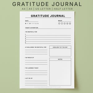 Puede incluir: Un diario de gratitud blanco con el título "GRATITUDE JOURNAL" en la parte superior. El diario incluye secciones para la fecha, el estado de ánimo, las intenciones diarias y las reflexiones. Disponible en tamaños A4, A5, US Letter y Half Letter.