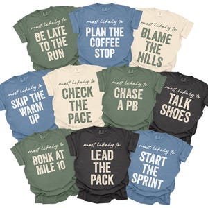May include: A collection of ten short-sleeved t-shirts in various colors, including green, blue, and black. Each shirt features the phrase "most likely to" followed by a running-related statement in white block letters, such as "Be Late to the Run."