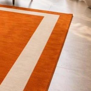 Modern Orange Area Rug with Cream Border Handmade Minimalist Living Room Carpet by AHSAN RUGS
