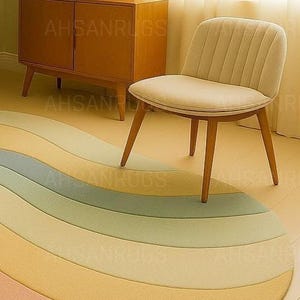 Round pastel area rug with abstract wavy pattern in soft hues of lavender, blush, yellow, green, and blue. Handmade wool rug styled in a modern boho living room with light green sofa, wooden cabinet, and neutral decor.