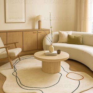 Modern irregular shaped cream rug with abstract wavy edge design, minimalist black and orange line art pattern, contemporary carpet for living room or bedroom décor.