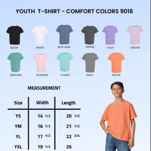 May include: A youth t-shirt in melon is modeled. The image shows t-shirts in black, white, blue jean, pepper, violet, orchid, seafoam, blossom, chalky, and gray. Measurements are provided for sizes YS, YM, YL, and YXL.