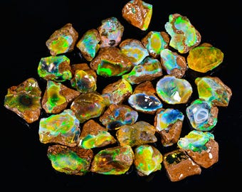 1550,00 CTS Lot de 65 pièces, opale d'Éthiopie brute, cristal d'opale brut, opale de jeu de feu, opale multicolore, pour la fabrication de bijoux 22X15X7-30X23X13 MM