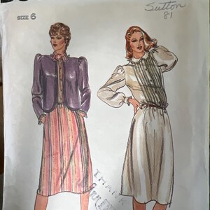 May include: Vintage Butterick sewing pattern, size 6, featuring illustrations of two women's outfits. One outfit includes a purple jacket and striped skirt, the other a white dress with vertical stripes. The pattern number is 3574.