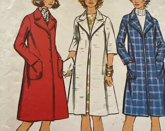 May include: A sewing pattern featuring three women wearing different coats. The woman on the left is wearing a red coat, the woman in the middle is wearing a white coat, and the woman on the right is wearing a blue and white plaid coat. The pattern includes instructions for sizes 20 and 42.