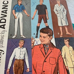 May include: A vintage sewing pattern for a Ken doll, Barbie's boyfriend. The pattern includes six different outfits, including a white robe, a red jacket, a blue shirt, and a black shirt. The pattern is titled "Ken, Barbie's Boyfriend" and is priced at 75 cents.
