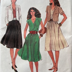 May include: A vintage McCall's sewing pattern featuring three illustrated women's outfits. The designs include a green dress with a red belt, a skirt and jacket ensemble, and a skirt and short-sleeved jacket. The pattern is labeled "MADE-FOR-YOU".