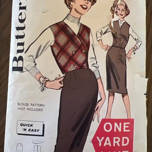 May include: Vintage sewing pattern for a dress with a vest. The pattern is from Butterick and is number 9442. The pattern is for a quick and easy project and only requires one yard of fabric.