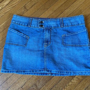 Von Dutch Made in USA denim miniskirt pockets Von Dutch label and tags size Large 100 % cotton lighter denim mini skirt Vintage Vom Dutch