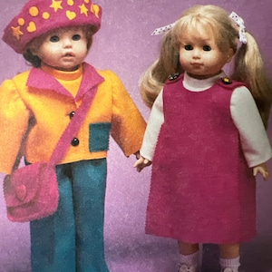 May include: Two dolls wearing outfits. The doll on the left is wearing a yellow jacket with a pink bag, teal pants, and a pink hat with yellow stars and circles. The doll on the right is wearing a white shirt, a pink dress, and white shoes. The text "Time to dream" is visible in the background.