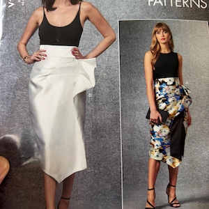 May include: Vogue Patterns V1684 sewing pattern. The pattern features a black top paired with a white skirt with a unique ruffle design. The image also shows a similar outfit with a floral skirt. The Vogue Patterns logo is visible.