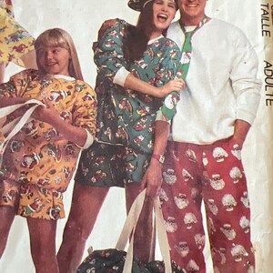 May include: A group of people wearing matching Christmas-themed outfits. The outfits include a green and white patterned top and skirt, a red and white patterned hat and pants, and a yellow and brown patterned top and shorts. A matching bag is also visible.