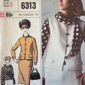 May include: Vintage Simplicity sewing pattern 6313 featuring a mustard yellow skirt suit and a white suit with a black polka dot scarf. The pattern includes a size 14 and bust 34 measurements. The image has a retro aesthetic.