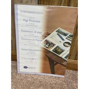 May include: A package of Creative Memories 12 x 15 inch page protectors. The package includes 15 sheets plus a bonus sheet. The packaging has text in English, French, Spanish, German, and Japanese.