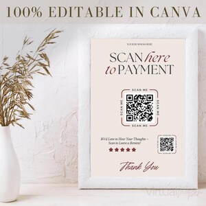 May include: A framed sign with the text "SCAN here to PAYMENT" and a QR code for payment. The sign also includes a QR code for reviews and the words "Thank You". The background is a light beige color.