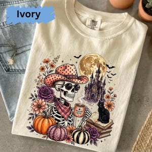 Spooky Skeleton Cowgirl Halloween Shirt, Black Cat Pumpkin Moon Tee, Western Gothic Halloween Shirt, Cozy Fall Aesthetic T-Shirt