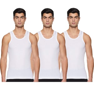 May include: Three white ribbed vests. The vests have a scoop neck and a ribbed texture. The image shows the vests on three people. The vests are a basic wardrobe staple.