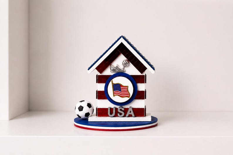 USA soccer decorative house displayed on clean white shelf with minimal background
