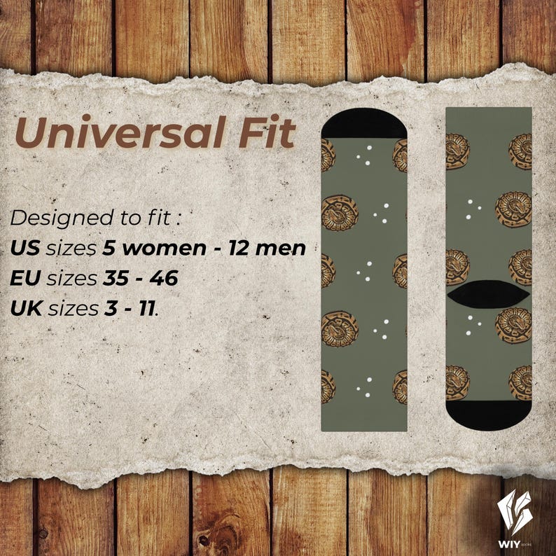 May include: Olive green socks featuring a repeating pattern of brown circular designs and white dots. The socks have black heels and toes. Text on the image reads "Universal Fit" and "US sizes 5 women - 12 men, EU sizes 35-46, UK sizes 3-11."