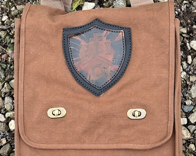 Canvas and leather messenger bag EITC