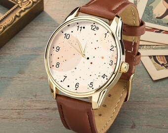 Reloj abstracto beige, reloj de pulsera minimalista neutro, diseño crema moteado
