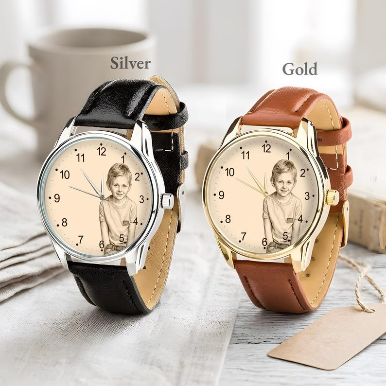 May include: Two wristwatches, one silver and one gold, each with a leather band and a photo on the watch face. The silver watch has a black band, and the gold watch has a brown band. The watch face displays the numbers 1 through 12.