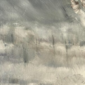May include: A close-up of a textured canvas painting with a light gray background and a hazy, white foreground. The painting depicts a landscape with a few trees in the distance.