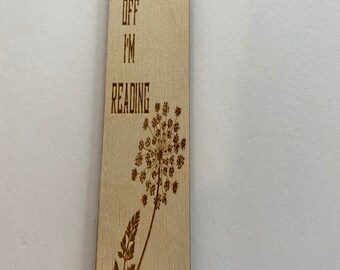 F*ck off I’m reading wooden book mark.