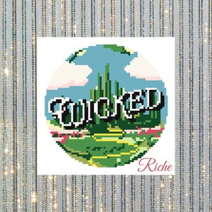 May include: A square print featuring a pixelated illustration of the Emerald City from the Wizard of Oz, with the word "WICKED" in a stylized font. The word "Riche" is written in cursive below the image.