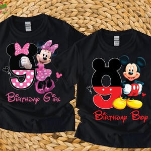 May include: Two black t-shirts with Mickey and Minnie Mouse designs. One shirt features Minnie Mouse with a pink bow and polka dot number 9, the text "Birthday Girl". The other shirt has Mickey Mouse with a red number 9 and the text "Birthday Boy".