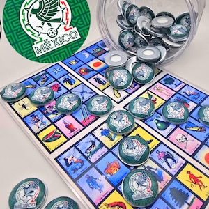 May include: A clear plastic jar filled with round metal pins featuring a green, white, and red Mexico eagle emblem. Several identical pins are scattered across a Lotería game board, which displays various colorful illustrations and Spanish text.