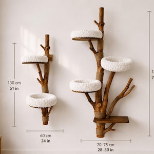 May include: Two wall-mounted cat trees made of natural wood branches with white plush circular platforms and jute rope accents. The smaller unit is 51 inches tall and 24 inches wide, while the larger unit is 71 inches tall and 28-30 inches wide.