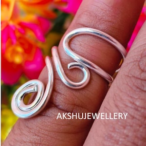 Handgemaakte sterlingzilveren spiraalring: verstelbare boho-sieraden