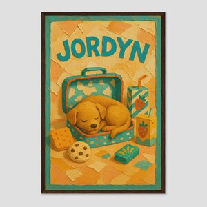 May include: A framed illustration featuring the name "JORDYN" in teal letters. A sleeping golden puppy rests in a teal lunchbox with white polka dots. The image includes a cookie, crackers, and juice boxes with strawberry graphics.