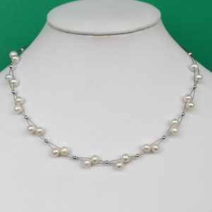 Beautiful Twisted Two Strands White Freshwater Pearl Necklace