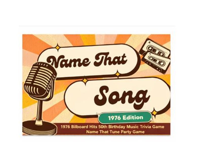 May include: A vintage-style game box with the words "Name That Song" in a retro font. The design includes a microphone, cassette tapes, and the text "1976 Edition". The background has an orange and yellow sunburst pattern.