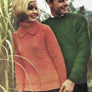 May include: A vintage photograph features a couple wearing knitted sweaters. The woman wears a coral-colored sweater with a scalloped collar. The man wears a green sweater. Both sweaters have a ribbed texture. The couple is smiling.