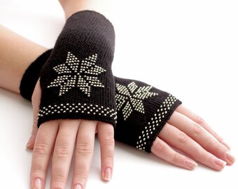 Very soft and cozy merino wool and acrylic blend beaded fingerless gloves/wrist warmers in black with a flower motif