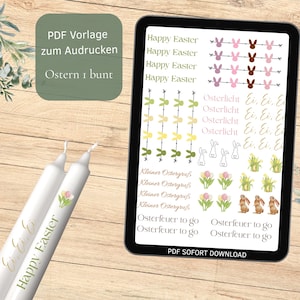 Könnte beinhalten: Ein digitales Ostern-Themen-Bild auf einem Tablet, mit Hasen-Silhouetten, floralen Designs und dem Text "Happy Easter". Zwei weiße Kerzen mit floralen Akzenten und dem Text "Happy Easter" sind ebenfalls zu sehen.