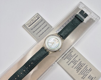 Vintage Swatch Automatic SAK100 (1992) — Schweizisk automatisk klocka med ask och papper