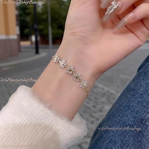 Rhinestone Star & Flower Bracelet: Gold Color Adjustable Bangle