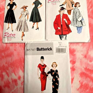 May include: Several vintage Butterick sewing pattern envelopes are displayed, featuring retro designs. The patterns showcase illustrations of dresses and coats. The envelopes are labeled with numbers like B6018, B5716, and B5707, and the "Retro Butterick" logo.