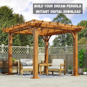 May include: A wooden pergola with a slatted roof, supported by four sturdy posts. Two wooden chairs with white cushions and a small table are placed inside. The text "BUILD YOUR DREAM PERGOLA INSTANT DIGITAL DOWNLOAD" is displayed above.