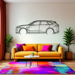 May include: A black metal car outline wall art decor above a yellow sofa with colorful pillows and a vibrant rug. The room includes potted plants and a small white table.