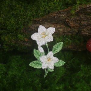 May include: A set of three ceramic mugs with a speckled, matte finish. The mugs are in shades of cream, light gray, and dark gray. Each mug has a simple, minimalist design, perfect for coffee or tea.