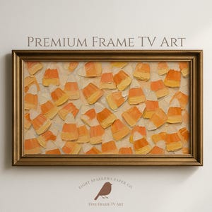 May include: A rectangular framed digital artwork titled PREMIUM FRAME TV ART featuring a repeating pattern of candy corn in shades of orange, yellow, and white with visible impasto-style brushstrokes, enclosed in a metallic gold frame.