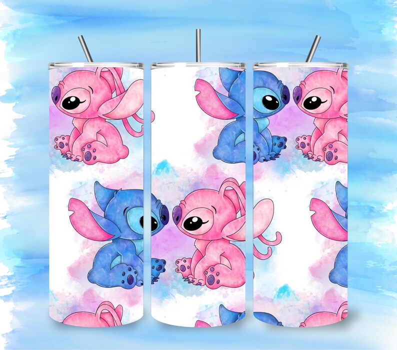 May include: Three stainless steel tumblers with a cartoon design featuring blue and pink alien characters. The tumblers have a white background with a watercolor effect in shades of blue, pink, and purple. Each tumbler has a silver straw.