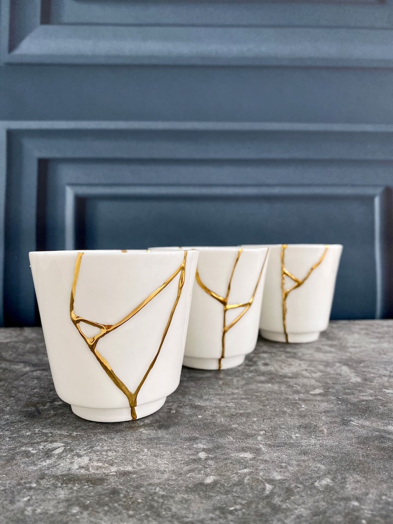 Kintsugi tea light holders white.