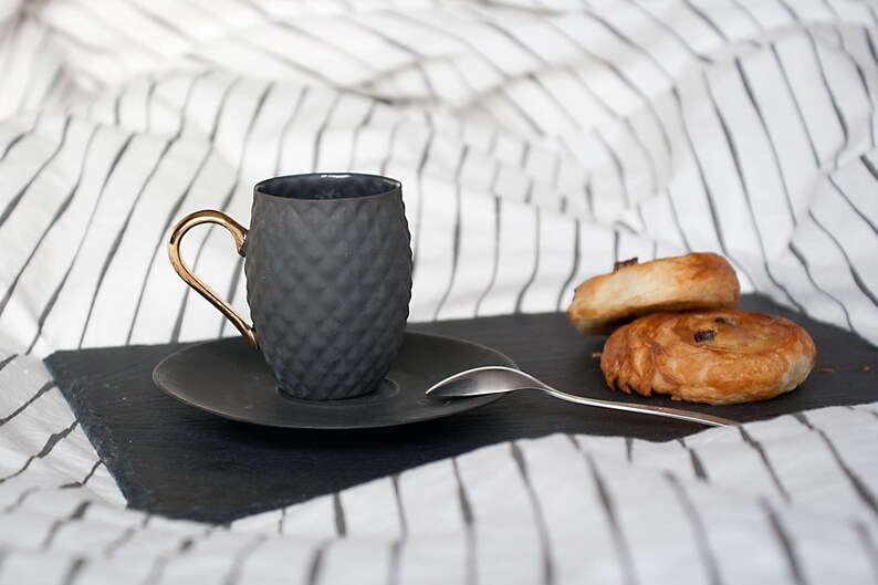 Small Black Textured Coffee Cup with Gold Handle